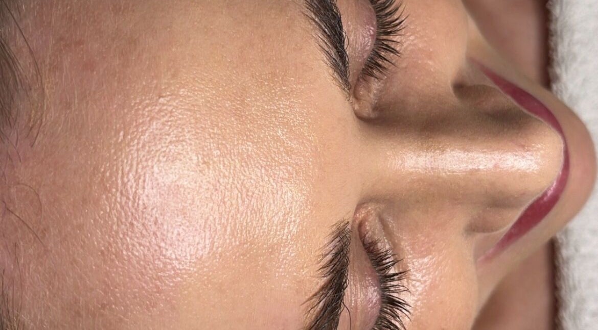 Close-up of a relaxed face with glowing skin at Advanced Therapeutic Clinic, Louth Village, County Louth, IE.