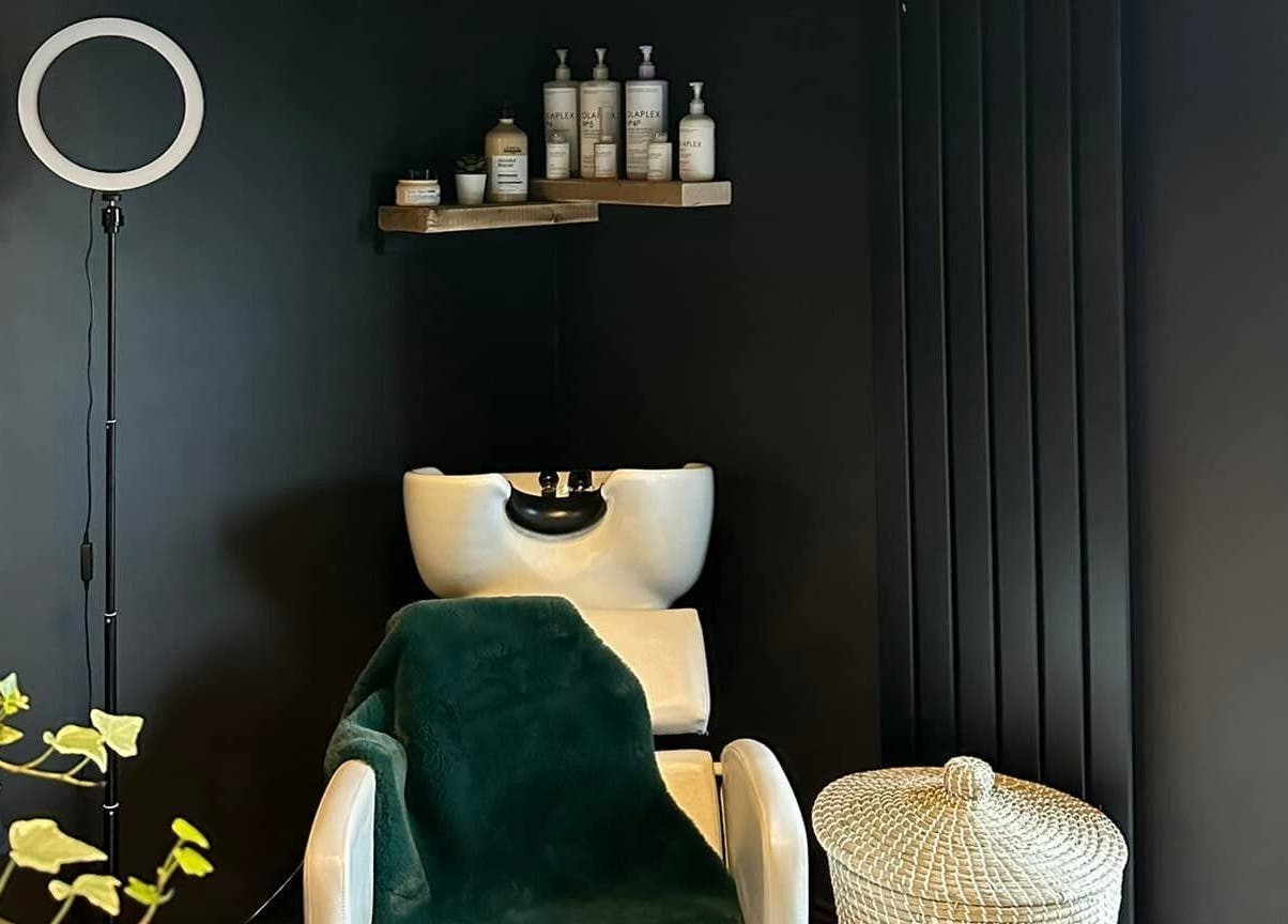Chic wash station at Aimee Baxter Hairdressing in Cupar, Scotland, GB, featuring luxury salon products.