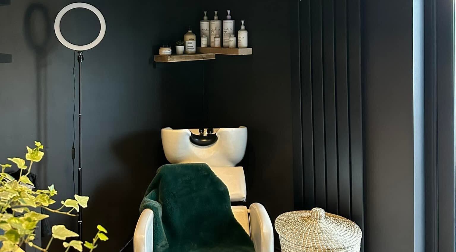Chic wash station at Aimee Baxter Hairdressing in Cupar, Scotland, GB, featuring luxury salon products.