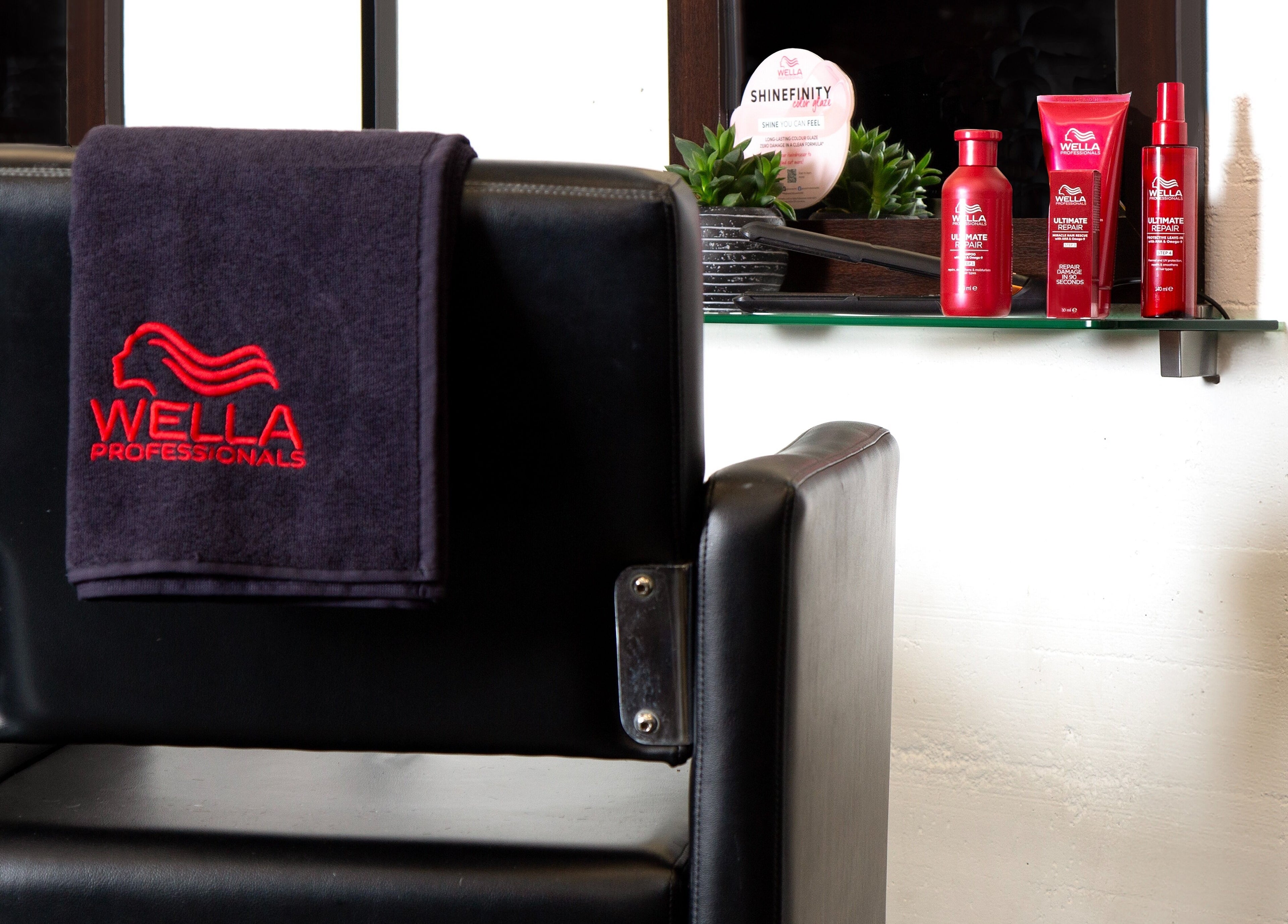 Elegant salon chair and hair products at Sphere, Palmerston North, Manawatu-Wanganui, NZ.