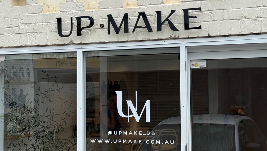 Entrance of Up Make - Double Bay located in Double Bay, New South Wales, AU, showcasing modern signage.