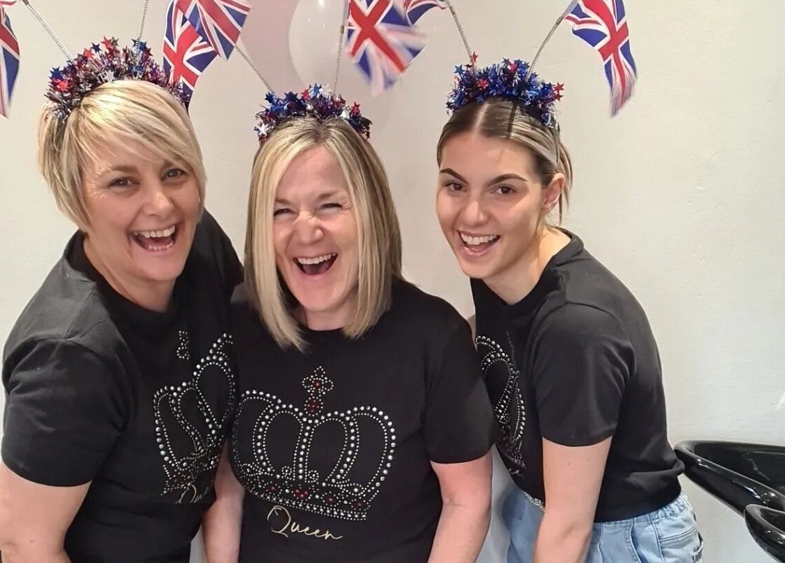 Team at Nix Creative Hair Design, Huddersfield, England, GB, celebrating with joy and Union Jack decorations.