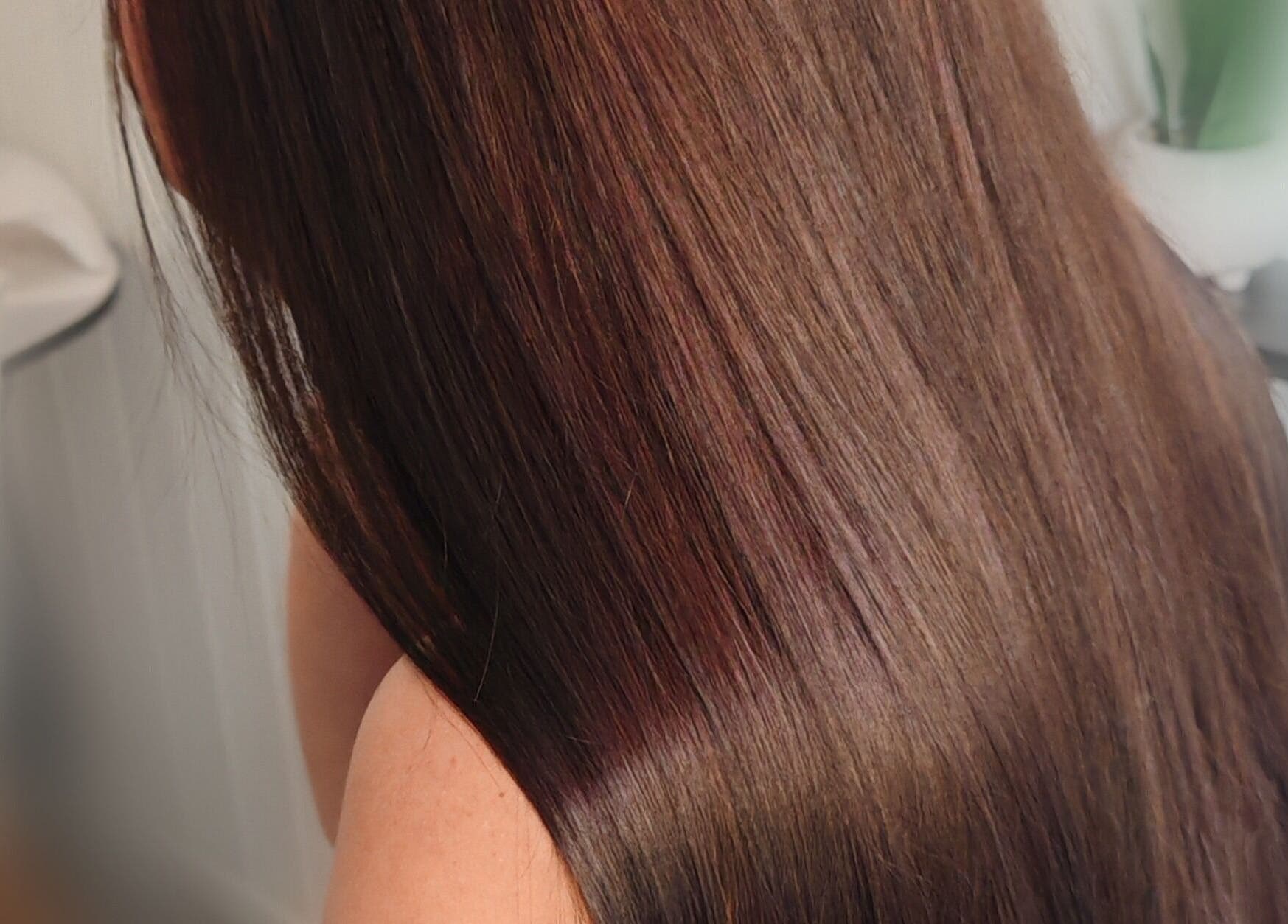 Smooth, shiny brown hair at Dannielle's Cutting Edge, Littlestone, England, GB.
