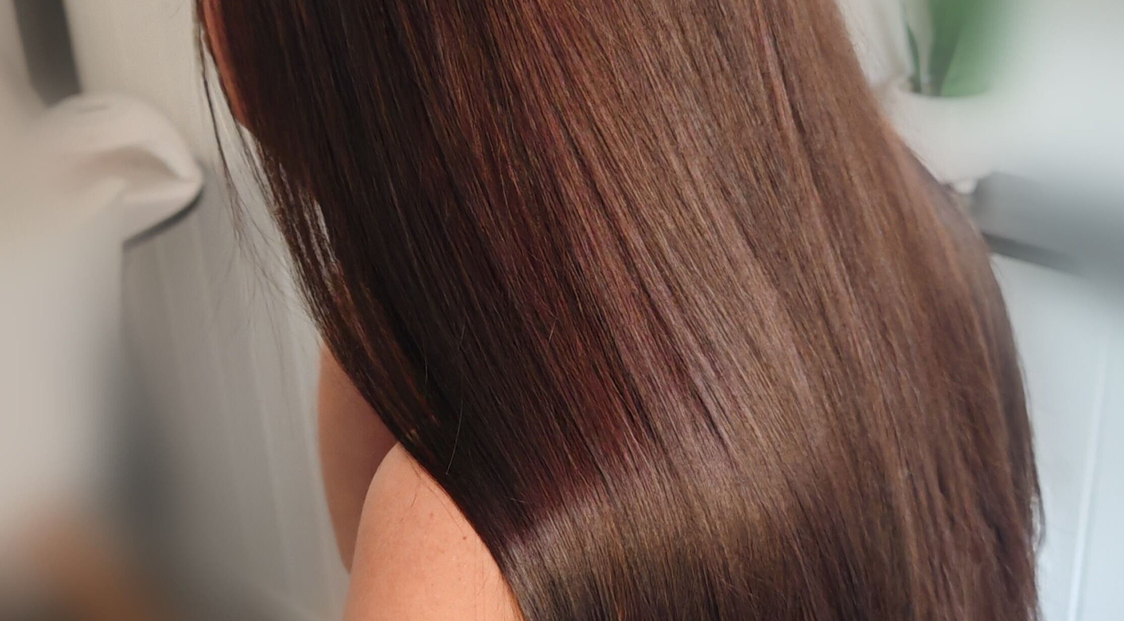 Smooth, shiny brown hair at Dannielle's Cutting Edge, Littlestone, England, GB.