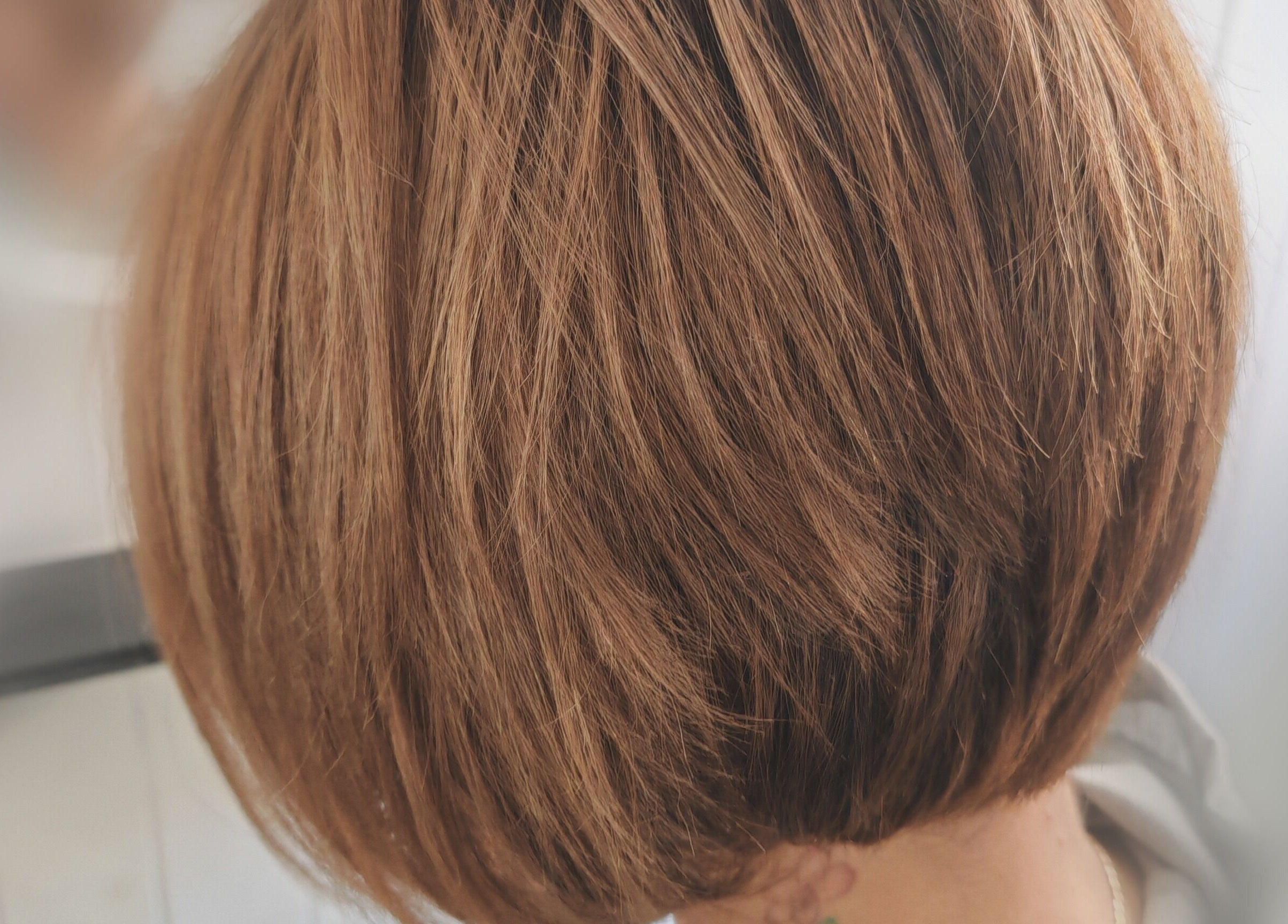 Chic auburn bob hairstyle at Dannielle's Cutting Edge, Littlestone, England, GB.