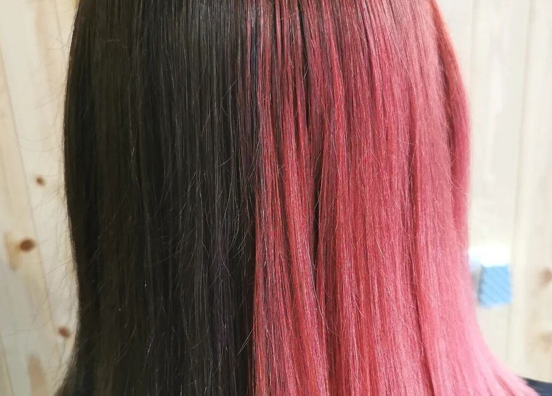Half pink, half brown hair at Dannielle's Cutting Edge, Littlestone, England, GB.