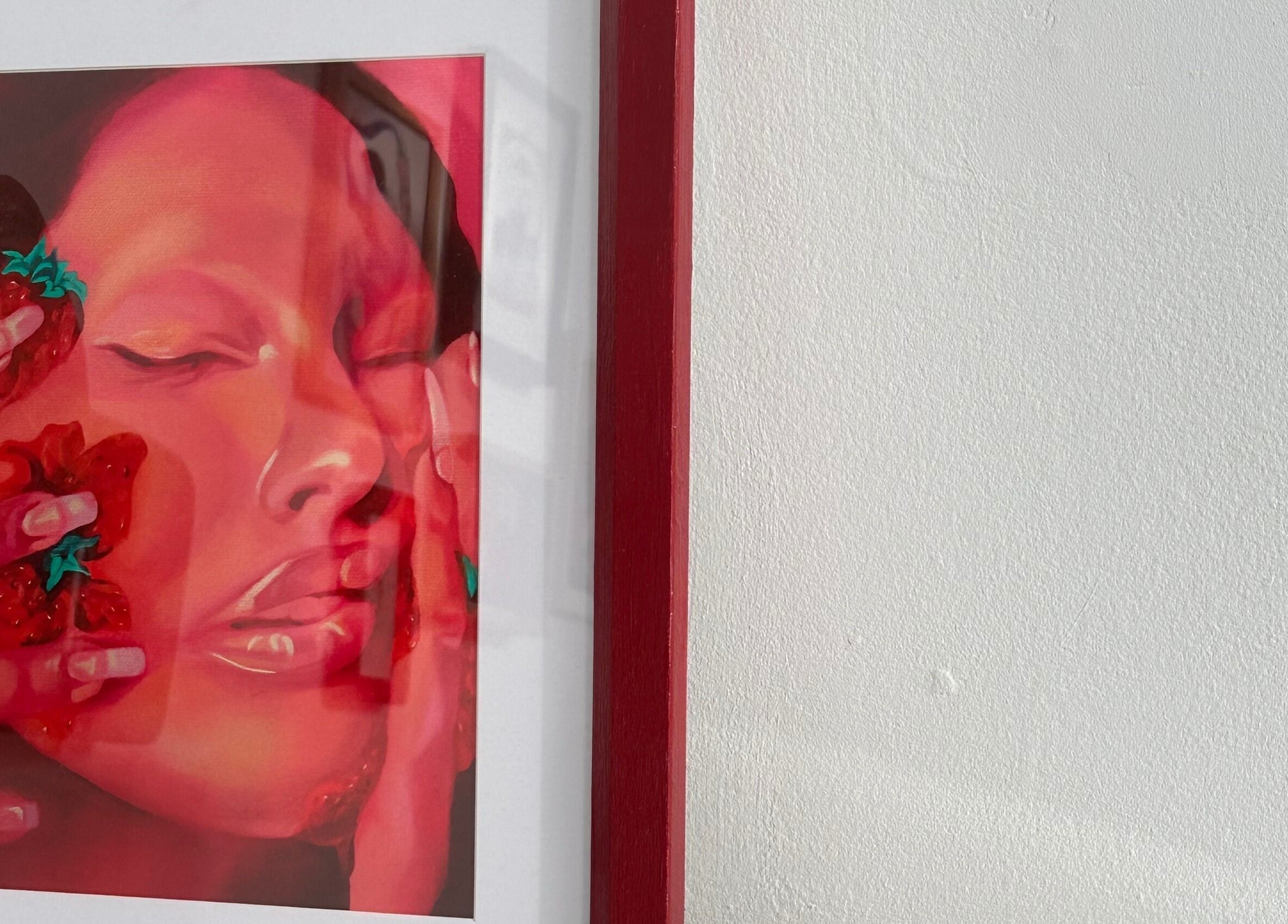 Vibrant painting of a serene face with strawberries at Néktar Studio, Melbourne, Victoria, AU.