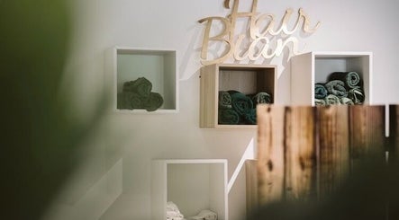 Elegant towel display at Laura Louise, London, England, GB. Aesthetic cubbies and wooden decor detail.