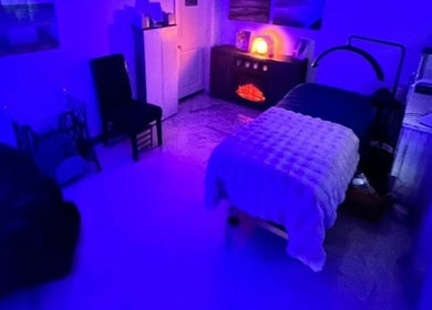 Relaxing blue-lit room at Skintastic Skin Care’s Lake Side Escape, Raymond, New Hampshire, US.