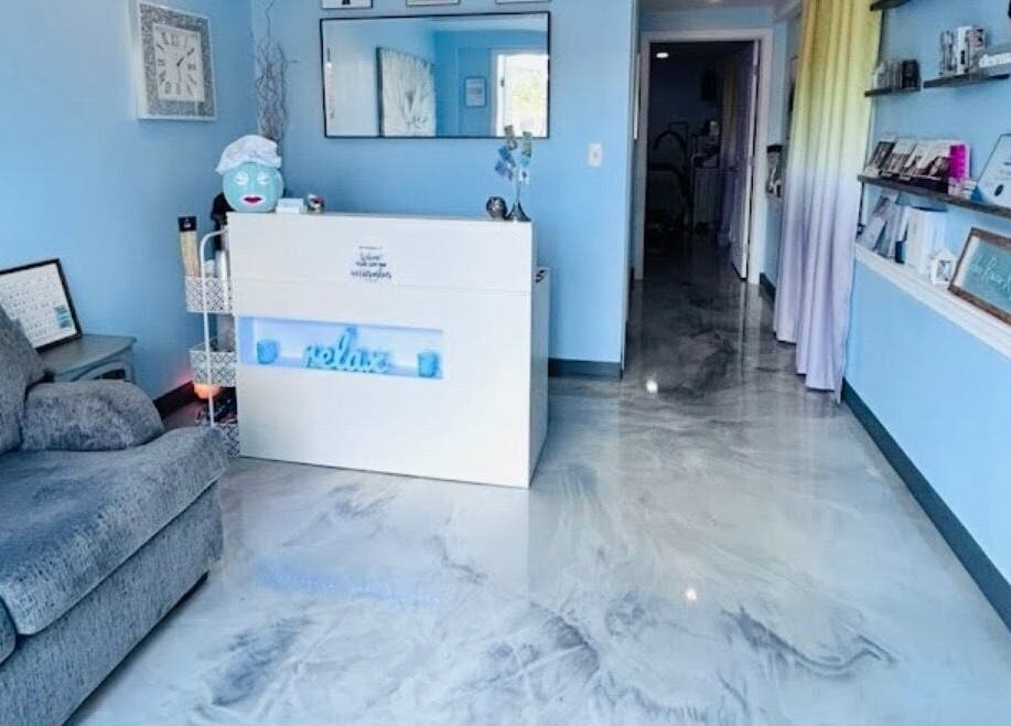 Inviting reception at Skintastic Skin Care’s Lake Side Escape in Raymond, New Hampshire, US, with soothing decor.