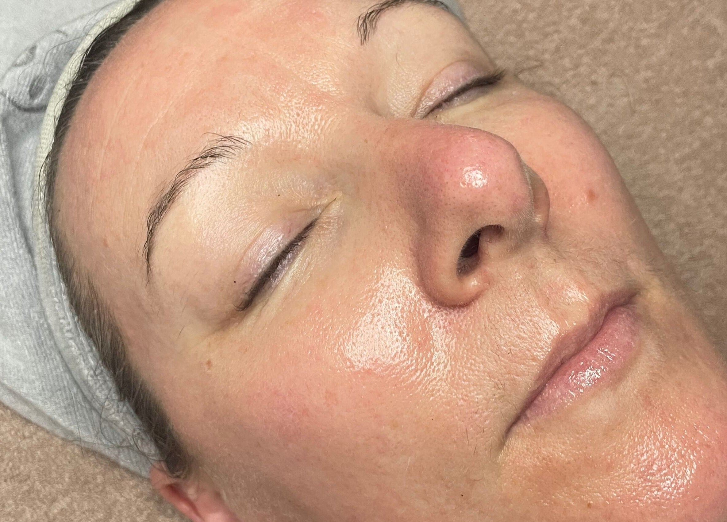 Relaxed face enjoying treatment at Little Rest Skin Treatment Room, Birmingham, England, GB.