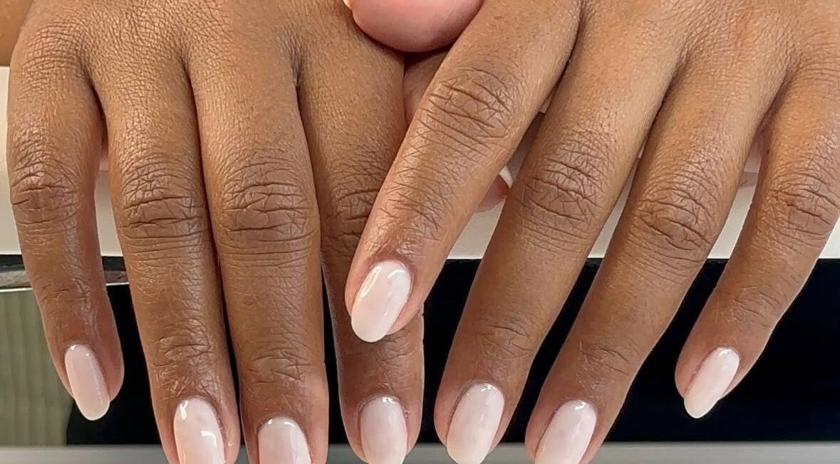 Beautiful manicured hands at In My Gel Era in Narwee, New South Wales, AU highlighting chic nail art.