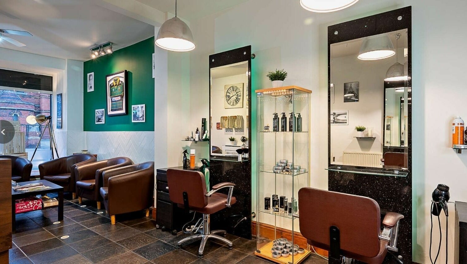 Modern salon interior at Daniel Antony, Northampton, England, GB, featuring stylish chairs and beauty products.