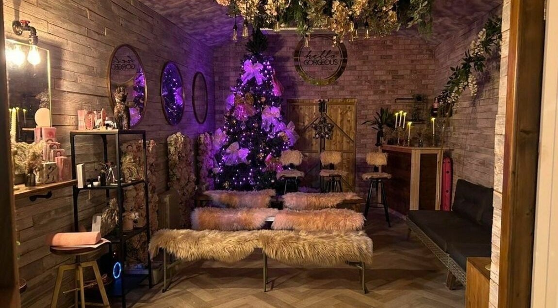 Cozy interior of Lash & Co, Fleetwood, England, GB, featuring elegant decor and ambient lighting.