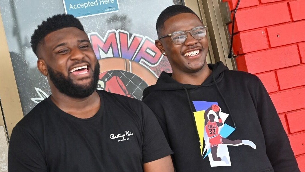 Happy clients outside MVP Cutz PTY LTD, Melbourne, Victoria, AU, showcasing vibrant community spirit.