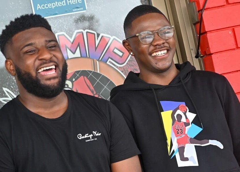 Happy clients outside MVP Cutz PTY LTD, Melbourne, Victoria, AU, showcasing vibrant community spirit.