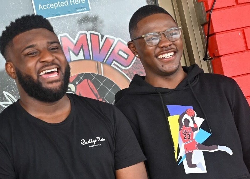 Happy clients outside MVP Cutz PTY LTD, Melbourne, Victoria, AU, showcasing vibrant community spirit.