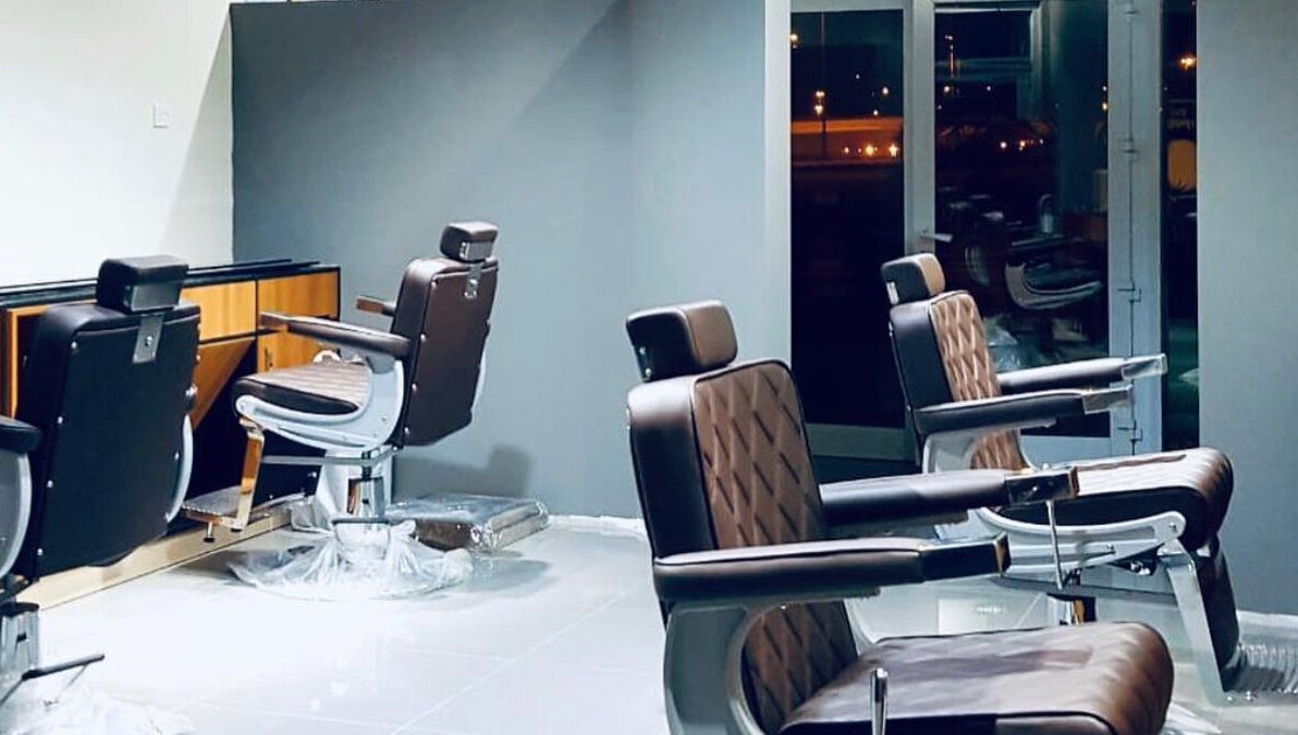 Modern barber chairs at The Clippers, Cluster Q, JLT in Dubai, Dubai, AE, showcasing luxurious salon interior.