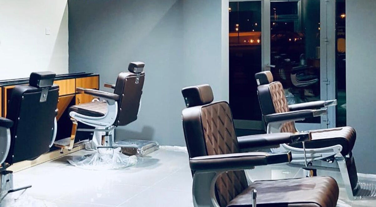 Modern barber chairs at The Clippers, Cluster Q, JLT in Dubai, Dubai, AE, showcasing luxurious salon interior.