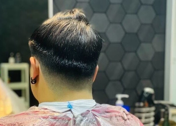 A stylish tapered haircut at The Clippers, Cluster Q, JLT, Dubai, Dubai, AE, showcasing expert grooming.