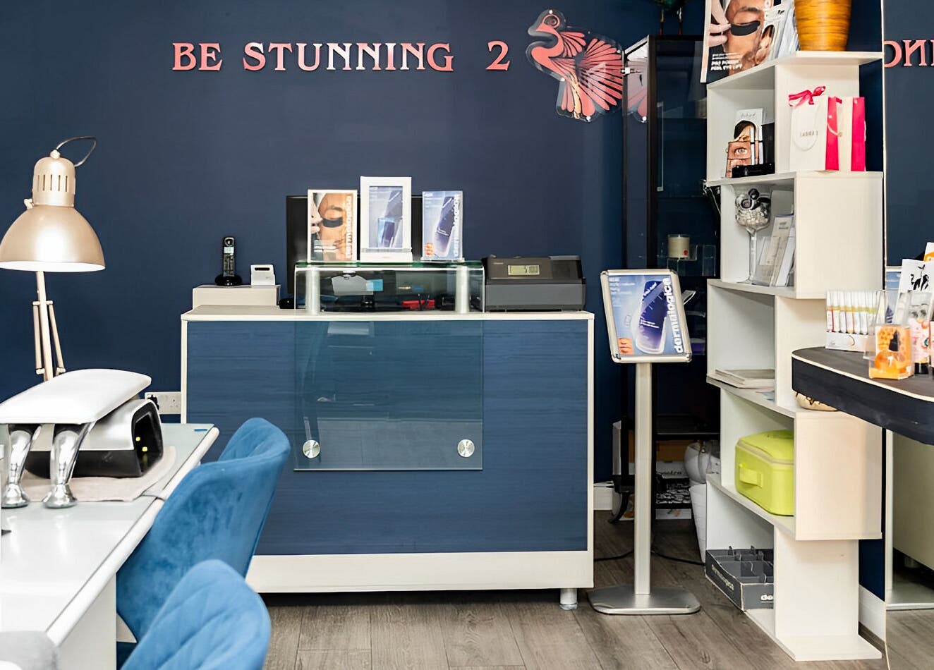 Stylish reception at Be Stunning Too in Whalley, England, GB with skincare displays and modern design.