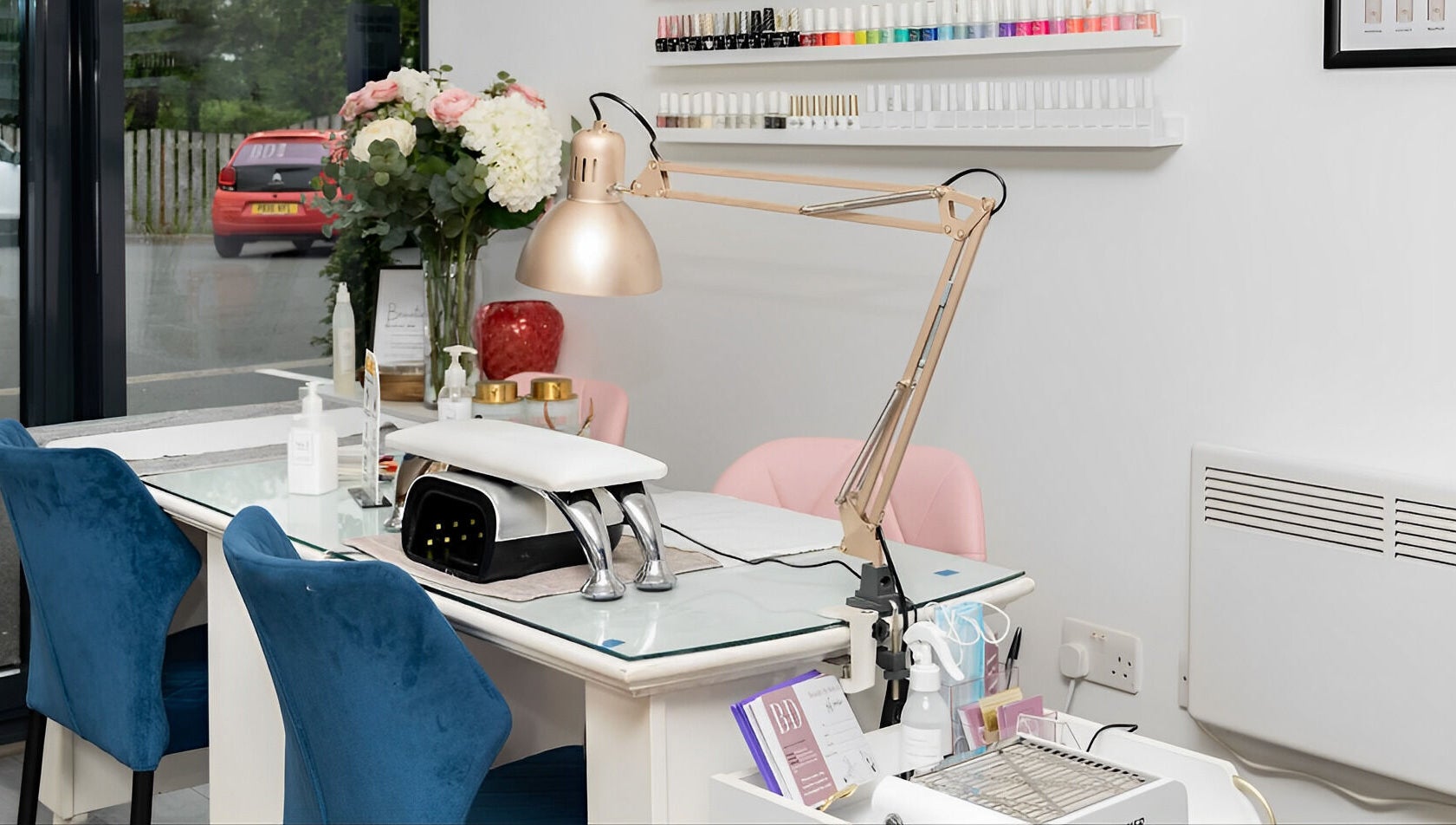 Elegant salon workspace at Be Stunning Too in Whalley, England, GB, featuring nail polish and stylish decor.