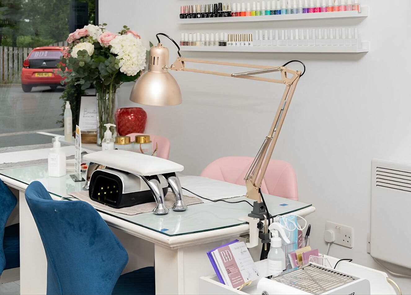 Elegant salon workspace at Be Stunning Too in Whalley, England, GB, featuring nail polish and stylish decor.