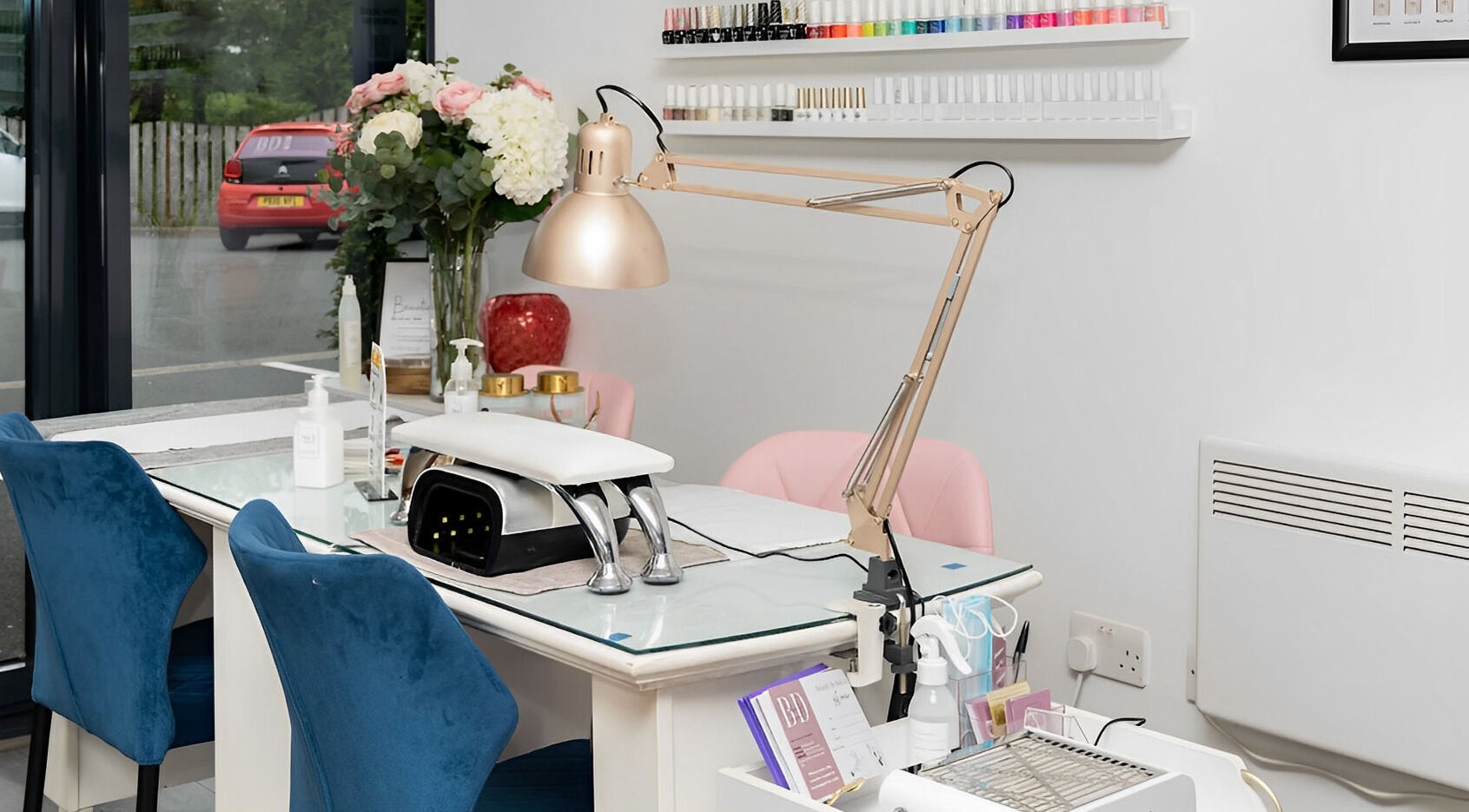 Elegant salon workspace at Be Stunning Too in Whalley, England, GB, featuring nail polish and stylish decor.