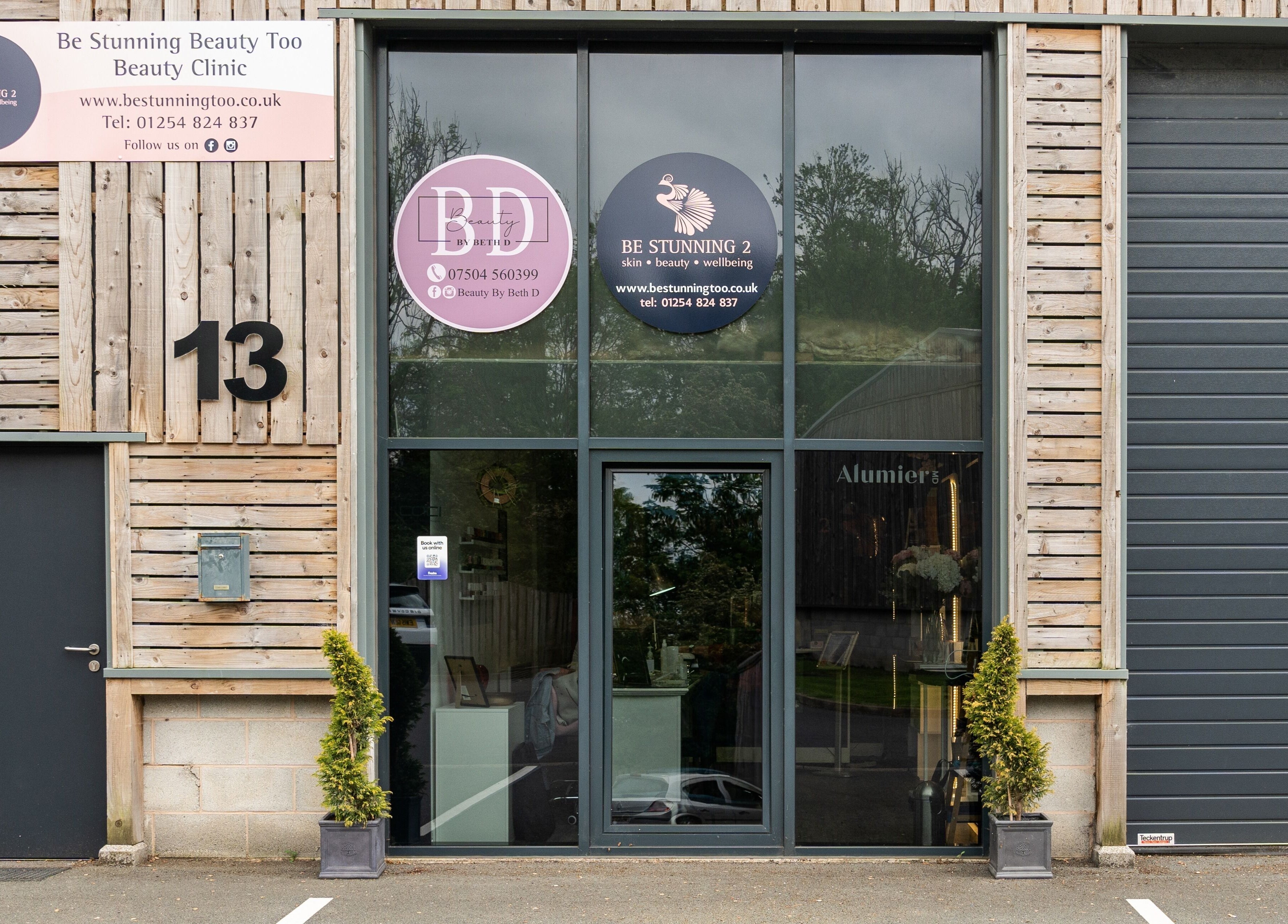 Front entrance of Be Stunning Too clinic in Whalley, England, GB showcasing modern design.