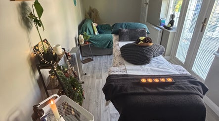 Cozy spa room at Wellness-On-Sea, Southend-on-Sea, England, GB, featuring a massage bed and calming decor.