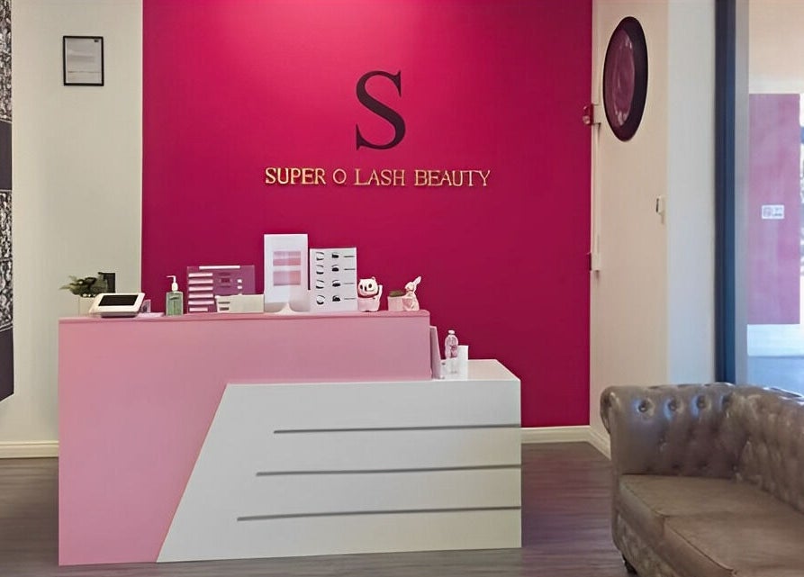 Chic reception area at Super Q Lash Beauty in Upland, California, US with pink decor and relaxing ambiance.
