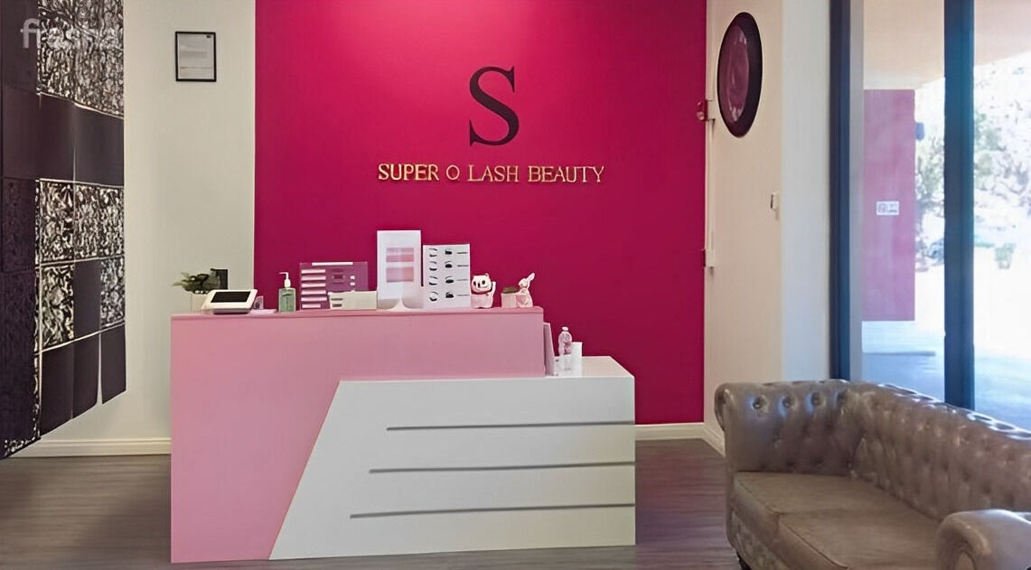 Chic reception area at Super Q Lash Beauty in Upland, California, US with pink decor and relaxing ambiance.