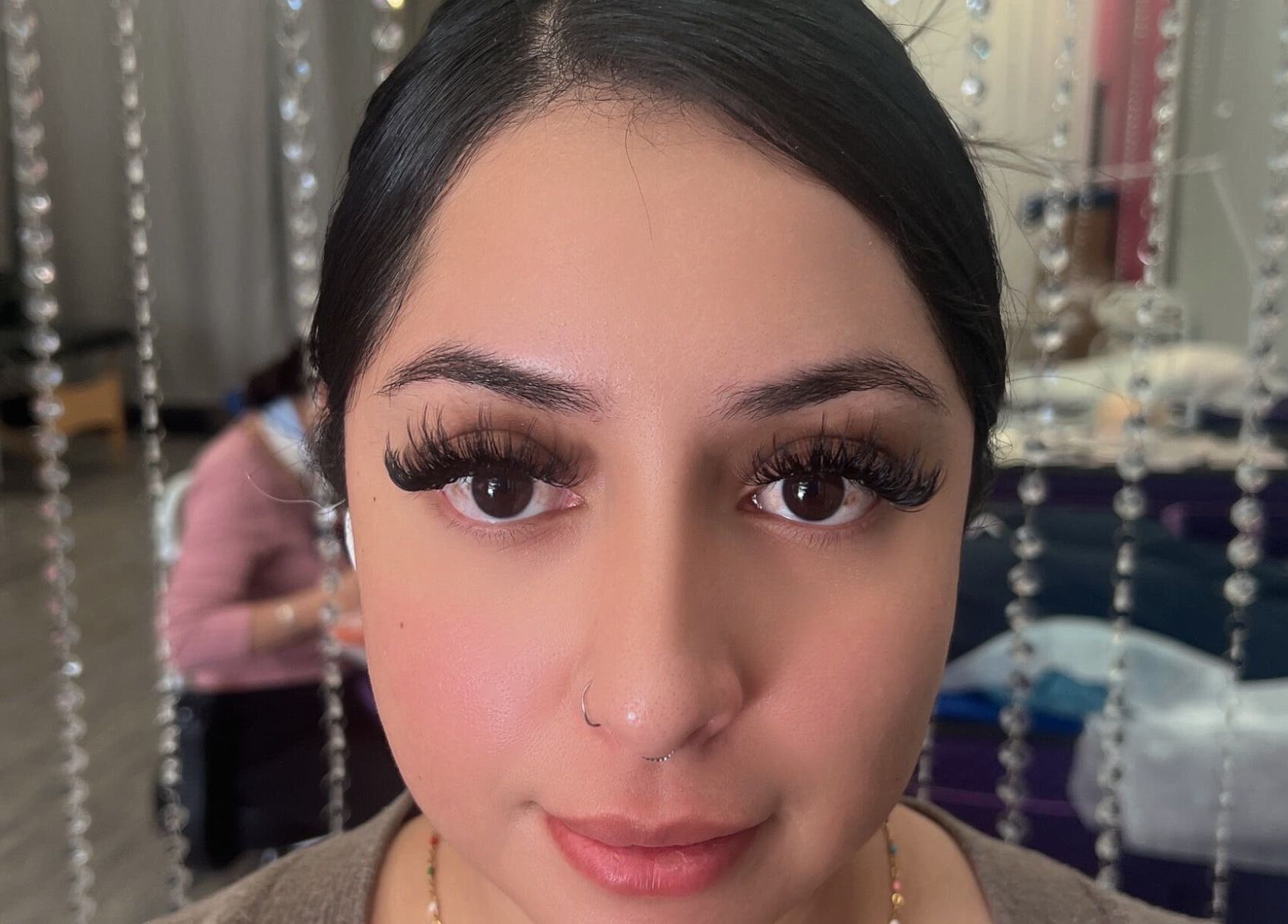 Close-up of eyelash extensions at Super Q Lash Beauty in Upland, California, US.