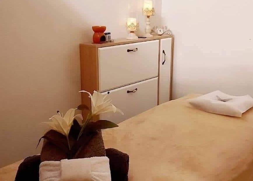 Relaxing massage room at Wai Thai Riccarton, Massage Clinic in Christchurch, NZ with soothing decor and cozy ambiance.