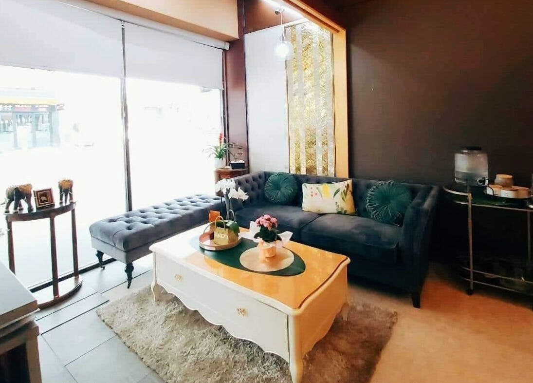 Relaxing lounge area at Wai Thai Riccarton, Massage Clinic, in Christchurch, NZ, featuring comfortable seating and decor.