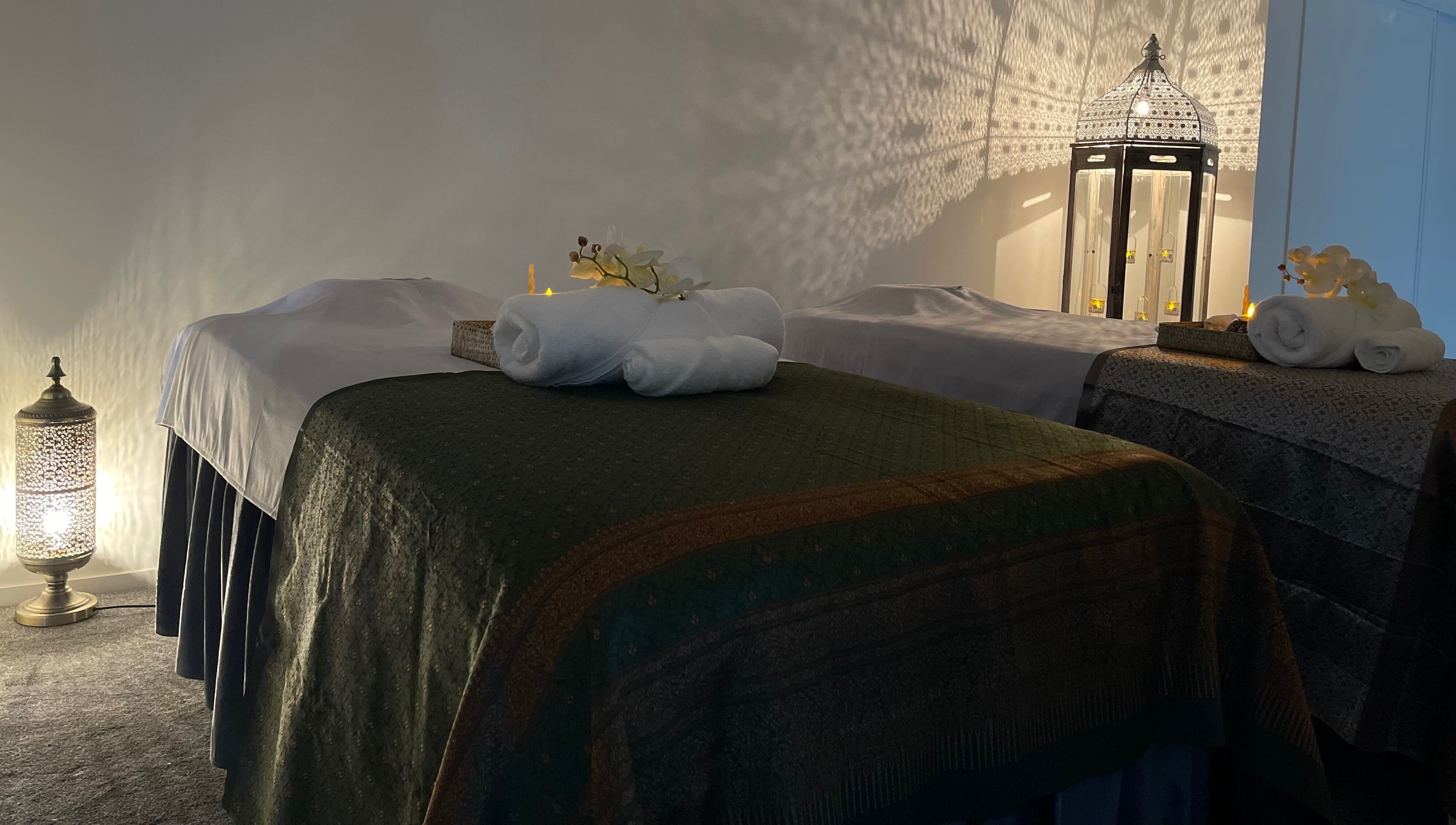 Tranquil massage room at Wai Thai New Brighton Massage Clinic, Christchurch, Canterbury, NZ with ambient lighting.
