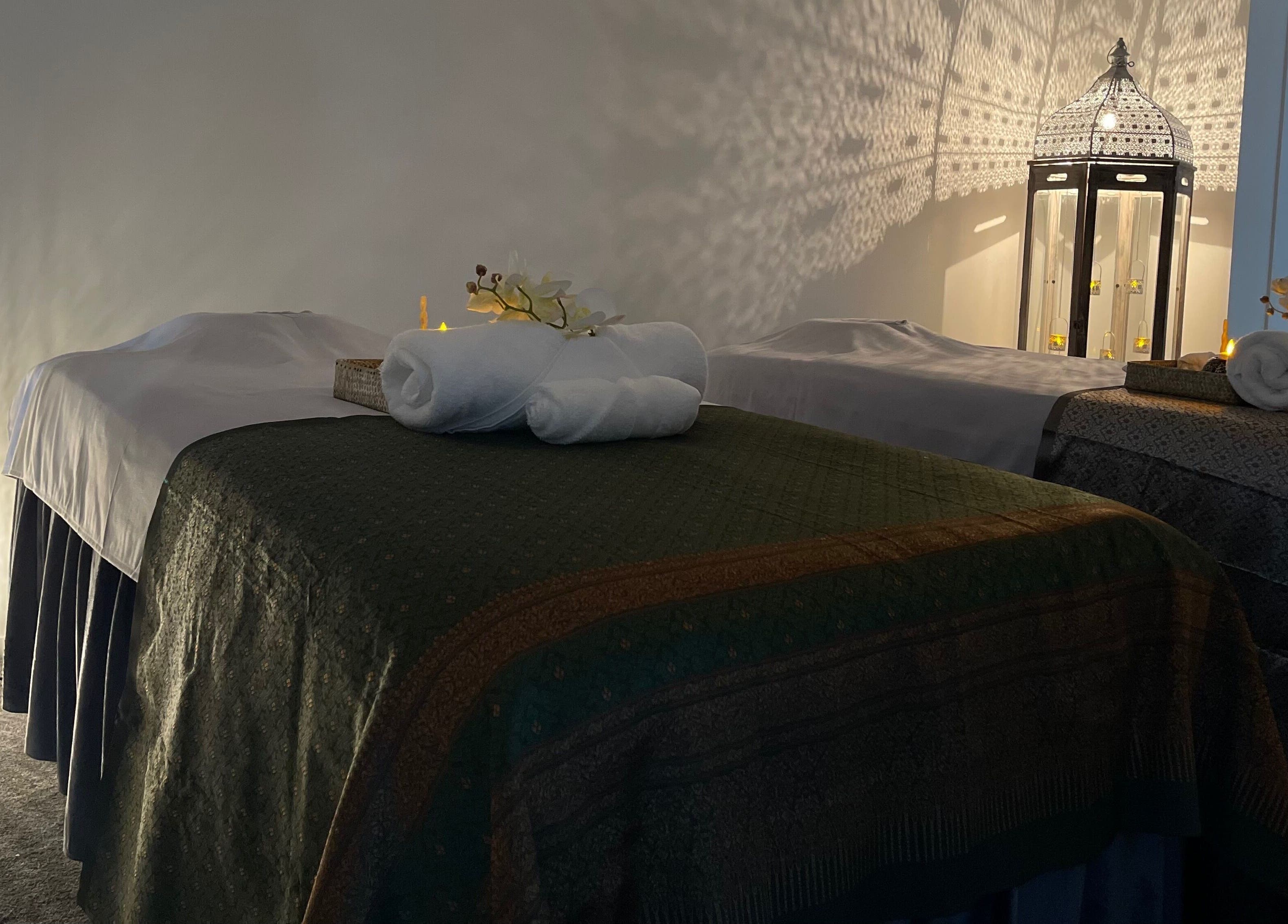 Tranquil massage room at Wai Thai New Brighton Massage Clinic, Christchurch, Canterbury, NZ with ambient lighting.