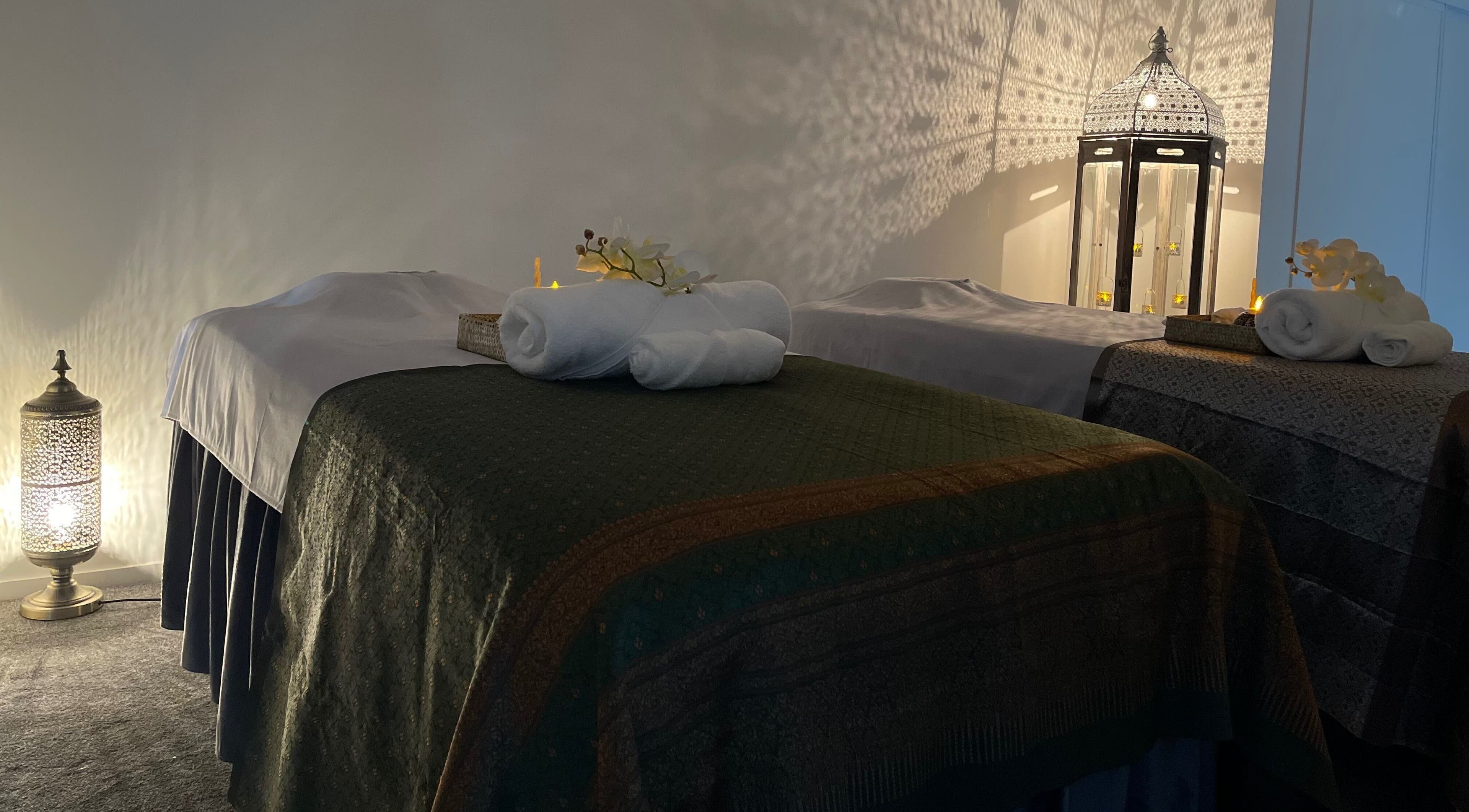 Tranquil massage room at Wai Thai New Brighton Massage Clinic, Christchurch, Canterbury, NZ with ambient lighting.