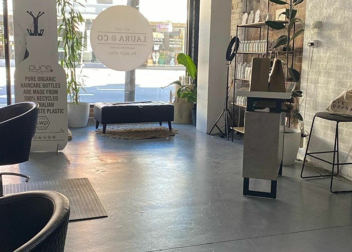 Modern salon interior at Laura and Co Hairdressing, Rozelle, New South Wales, AU showcasing sleek decor.