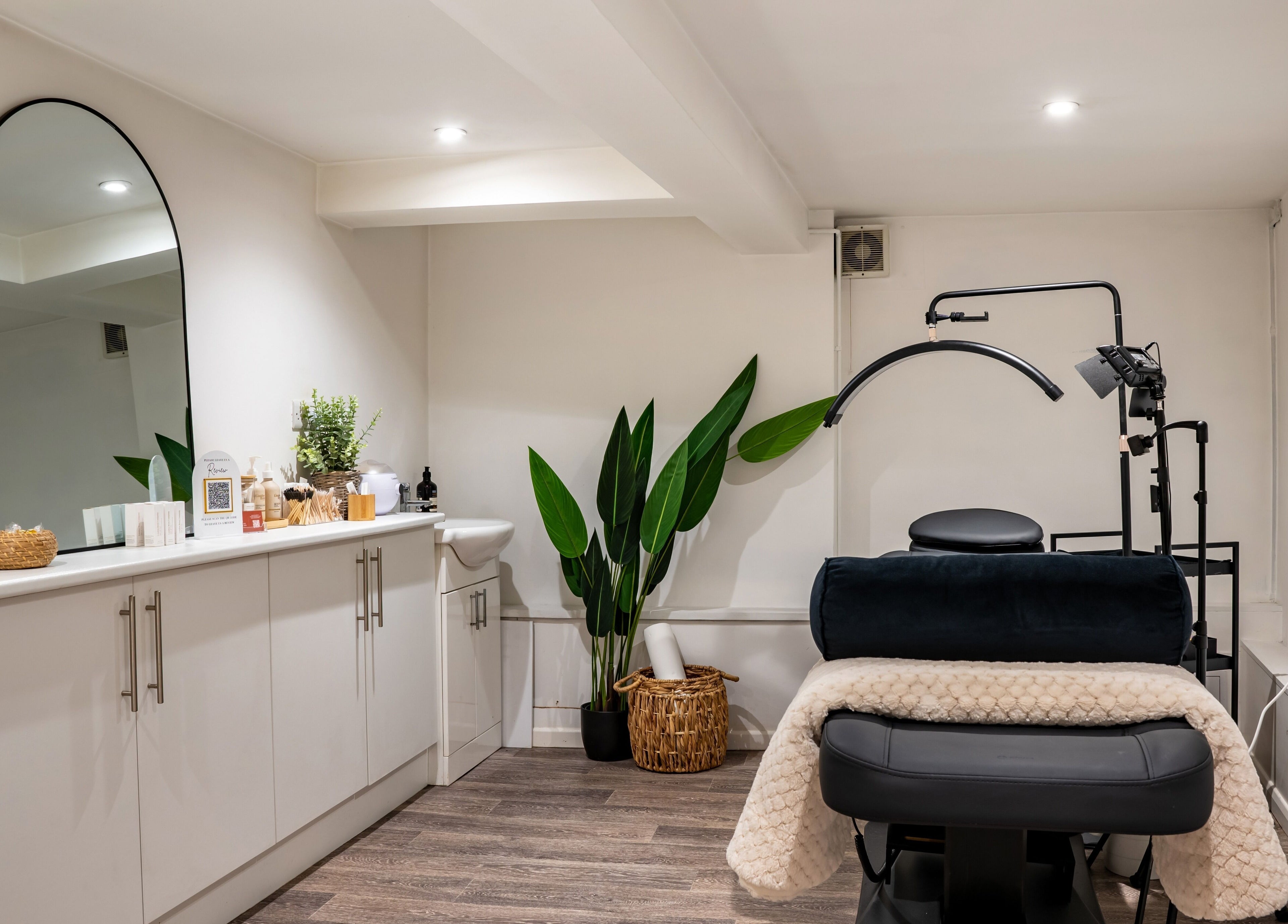 A serene, modern spa room at Design A Head Sevenoaks, Sevenoaks, England, GB with elegant decor and cozy ambiance.