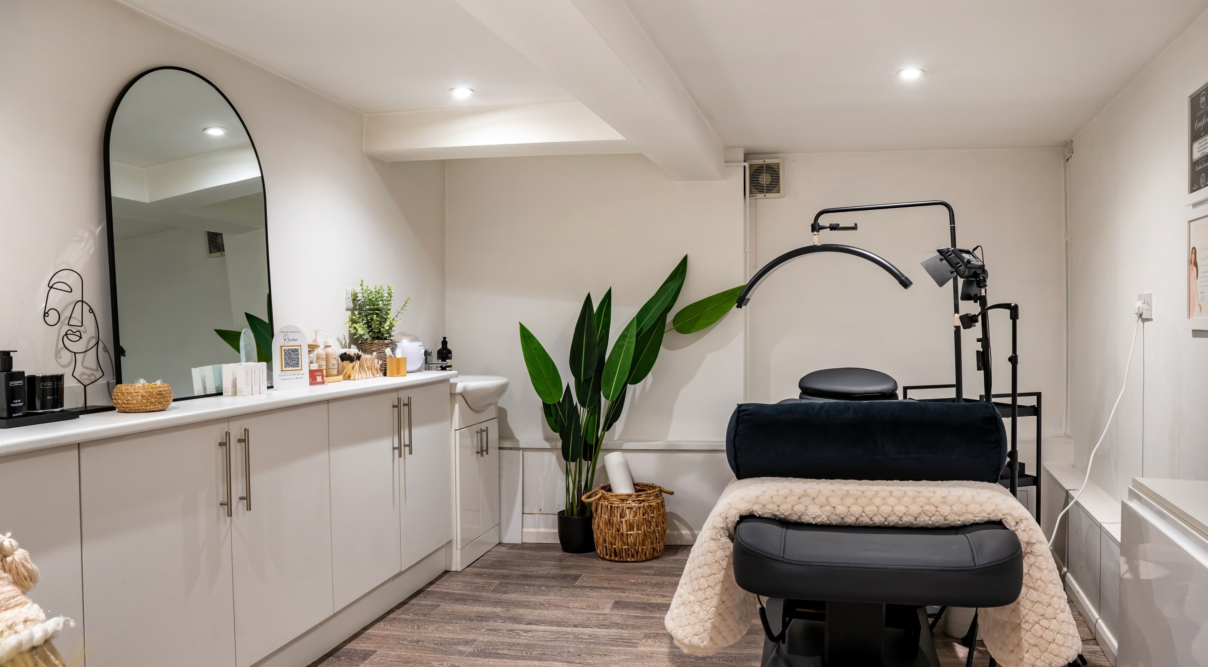 A serene, modern spa room at Design A Head Sevenoaks, Sevenoaks, England, GB with elegant decor and cozy ambiance.