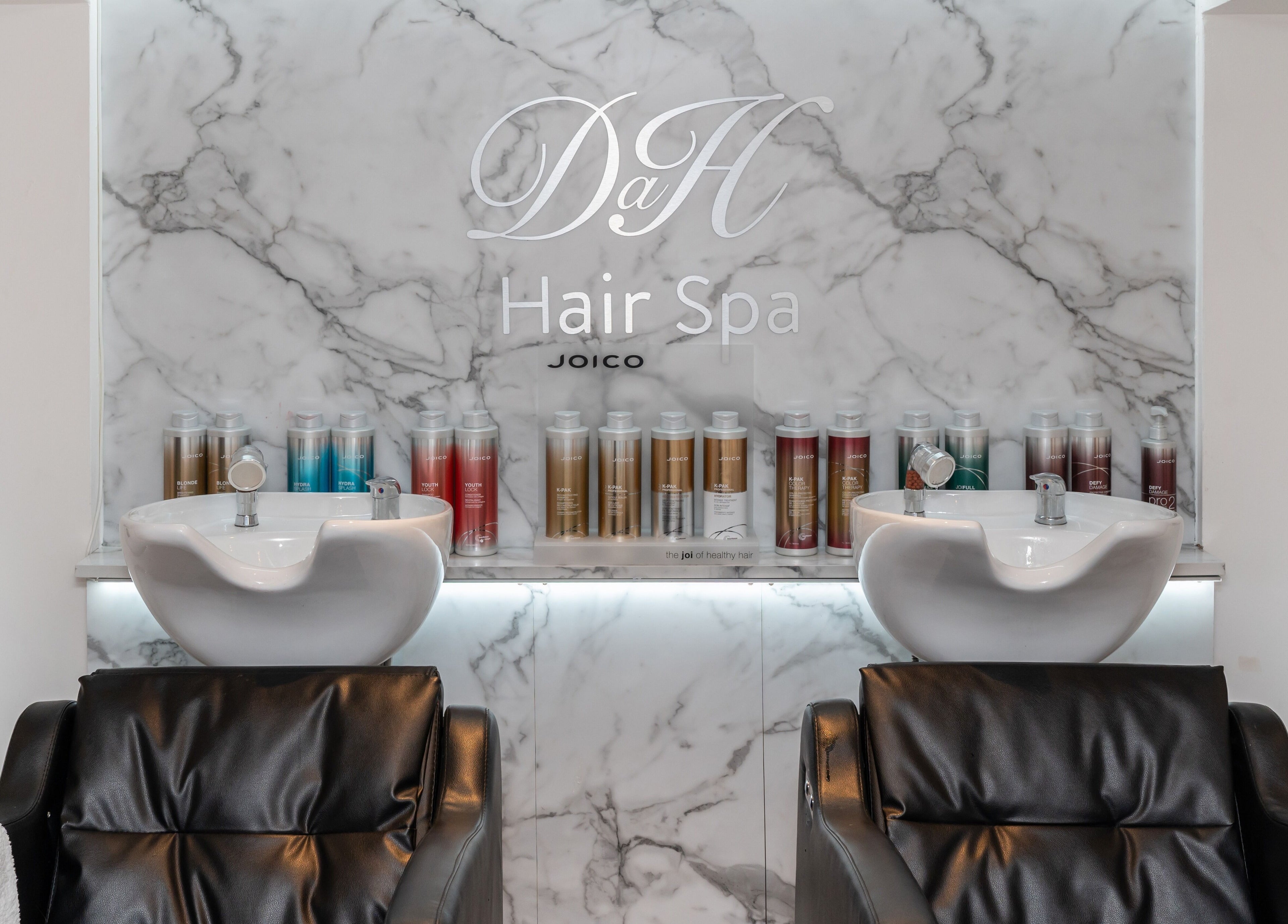 Design A Head Sevenoaks salon features luxury hair spa chairs and modern décor in Sevenoaks, England, GB.