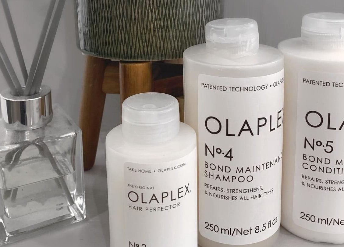 Olaplex hair care products on display at Design A Head Tonbridge, Tonbridge, England, GB.