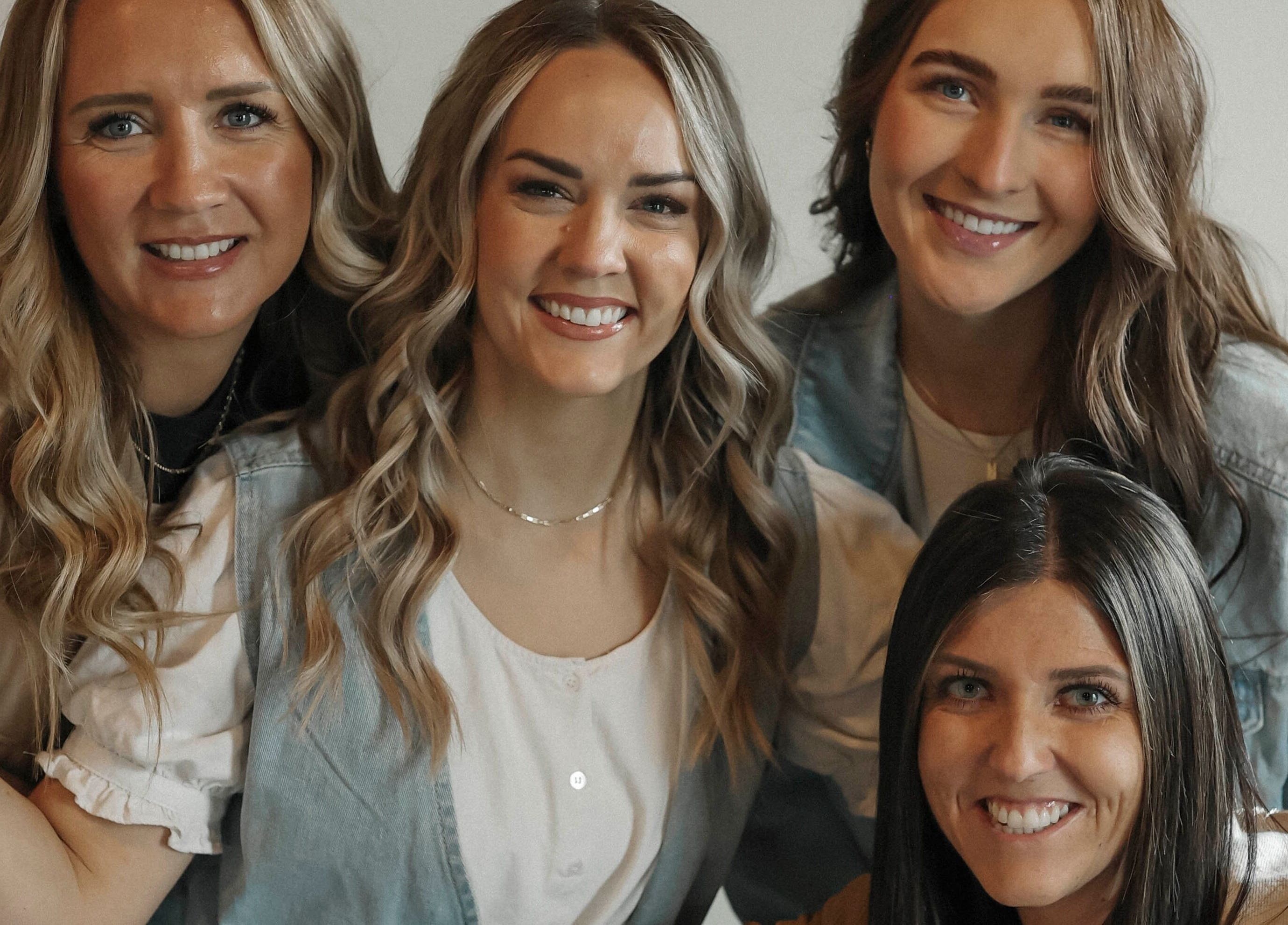 Team at Camille Dawn Studio in Fillmore, Utah, US, smiling warmly for a group photo.