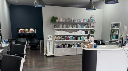 Modern beauty salon interior at Ooh Hair and Beauty, Wolverhampton, England, GB showcasing sleek design and products.