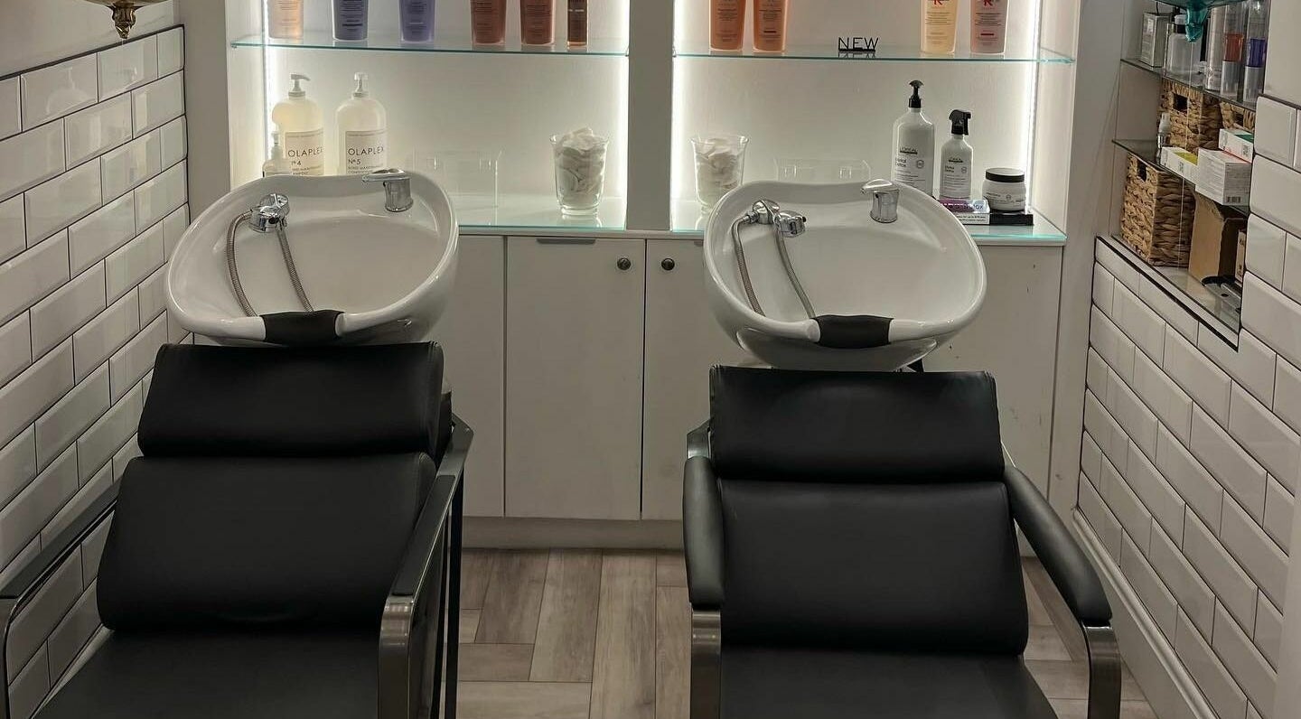 Elegant wash stations at Rebecca Dixon Hairdressing in Dinnington, England, GB offering premium salon services.