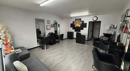 Modern interior of Adele's Hair & Beauty in Walsall, England, GB, showcasing styling chairs and decor.