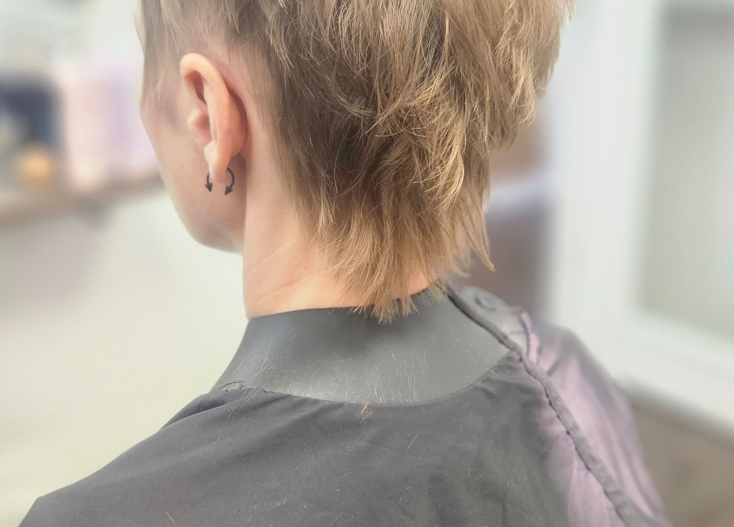 Modern undercut hairstyle at Roxstar Hair Design, Punta Gorda, Florida, US showcasing edgy style and flair.