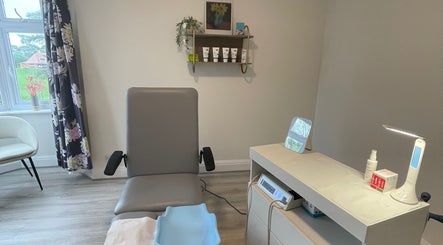 Comfortable treatment room at MY FOOT CLINIC Winton, Bournemouth, GB with cozy chair and modern equipment.