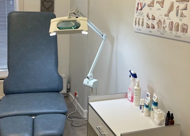 Treatment room at MY FOOT CLINIC (Parkstone), Poole, England, GB featuring a therapy chair and professional equipment.